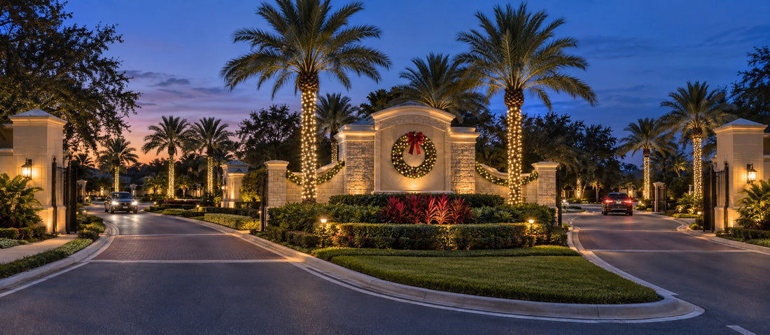 Professional Christmas lighting at an HOA community entrance in Central Florida