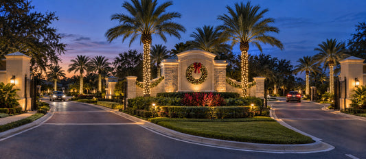 Professional Christmas lighting at an HOA community entrance in Central Florida