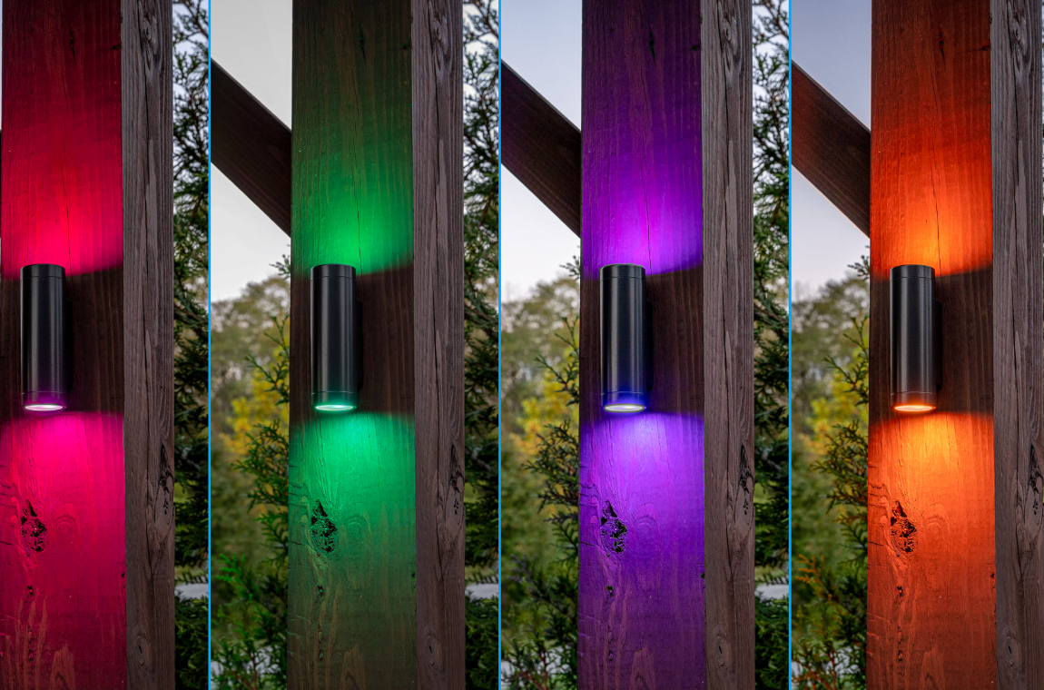 Color-changing LED wall sconce lighting installed on a lanai post showing multiple lighting color options for outdoor pool and patio areas